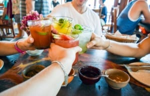 Photo of Friends "Cheersing" at Beachfront Kitchen, One of the New Restaurants in Myrtle Beach